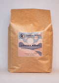 Common Friends medium-light roast whole bean coffee in a 5 lb bag