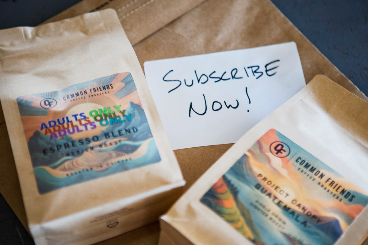 Common Friends coffee bags with a handwritten Subscribe Now card